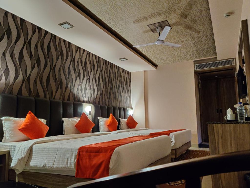 Postel nebo postele na pokoji v ubytování Hotel Vip Square