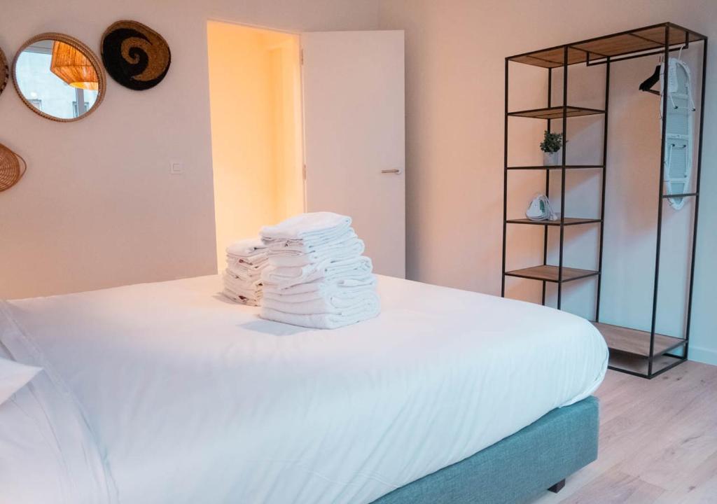 Una cama o camas en una habitación de Smartflats - Antwerp View