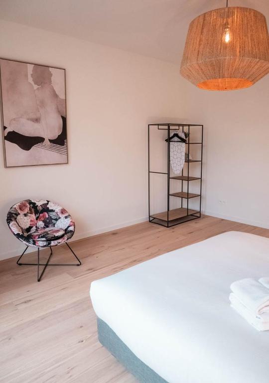 Una cama o camas en una habitación de Smartflats - Antwerp View