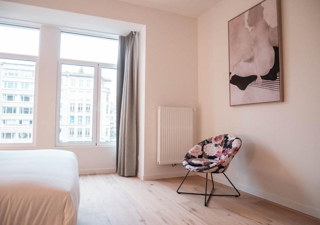 Una cama o camas en una habitación de Smartflats - Antwerp View