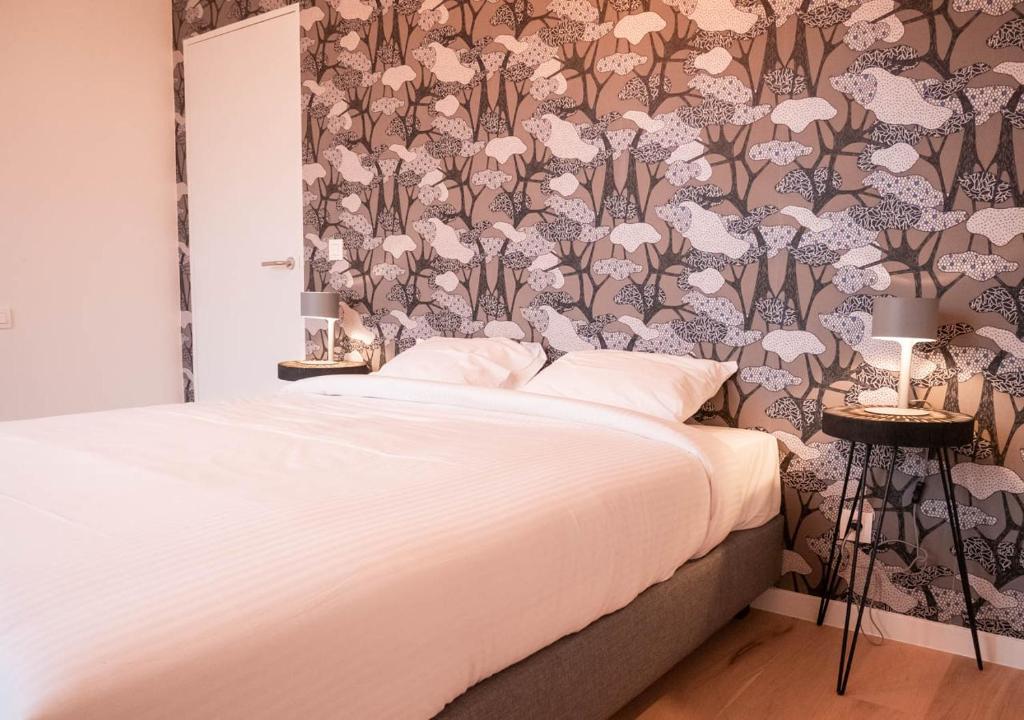 Una cama o camas en una habitación de Smartflats - Antwerp View