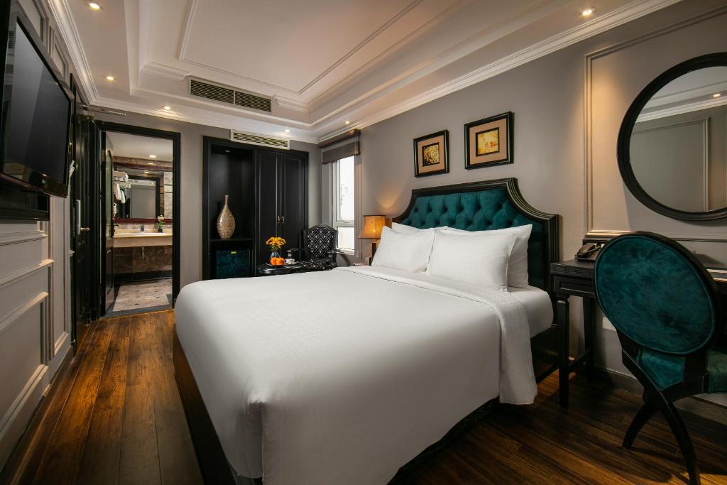 Postel nebo postele na pokoji v ubytování Scent Premium Hotel