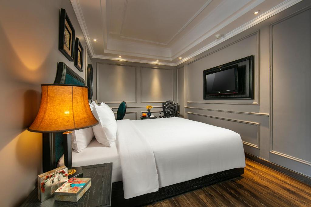 Postel nebo postele na pokoji v ubytování Scent Premium Hotel