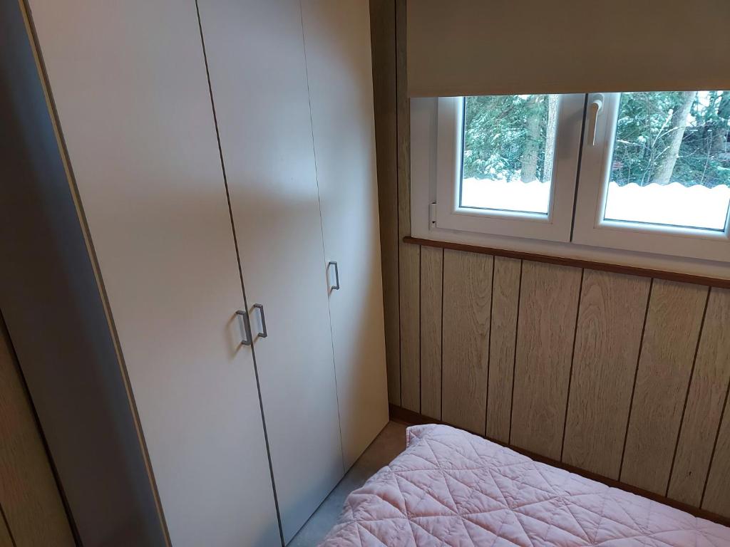 Postel nebo postele na pokoji v ubytování Chalet Sorgenfri