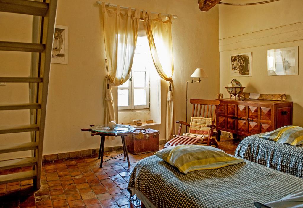 Postel nebo postele na pokoji v ubytování Demeure de Digoine "Chambre d'Hotes"