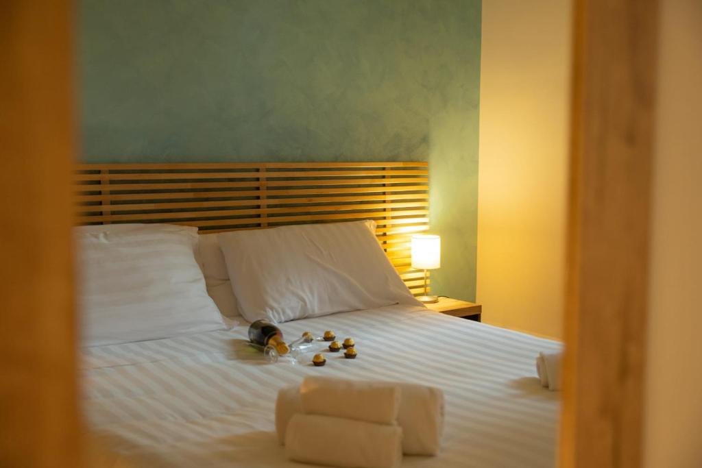 Cama ou camas em um quarto em Romerooms