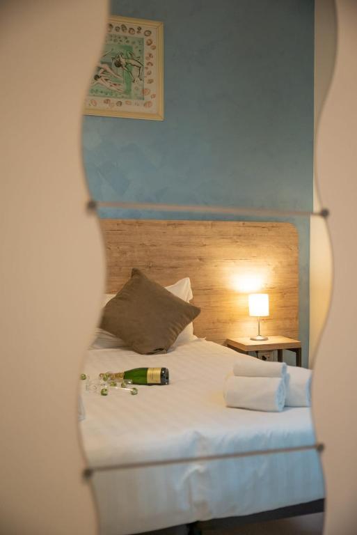 Cama ou camas em um quarto em Romerooms