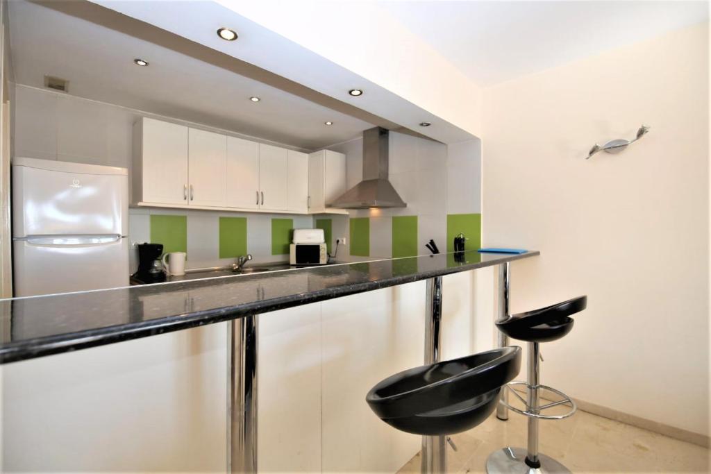 Kuchyň nebo kuchyňský kout v ubytování Apartment LONDON