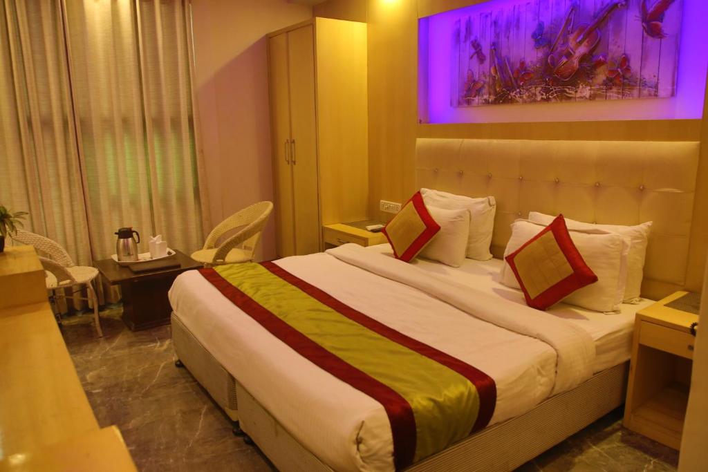Postel nebo postele na pokoji v ubytování Hotel Shelton