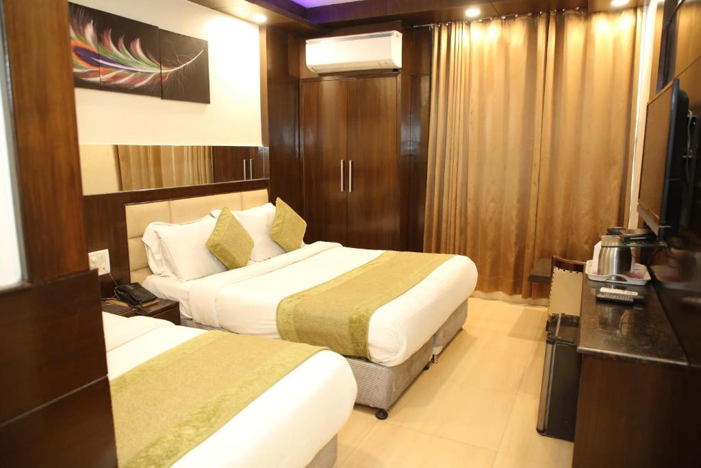 Postel nebo postele na pokoji v ubytování Hotel Shelton