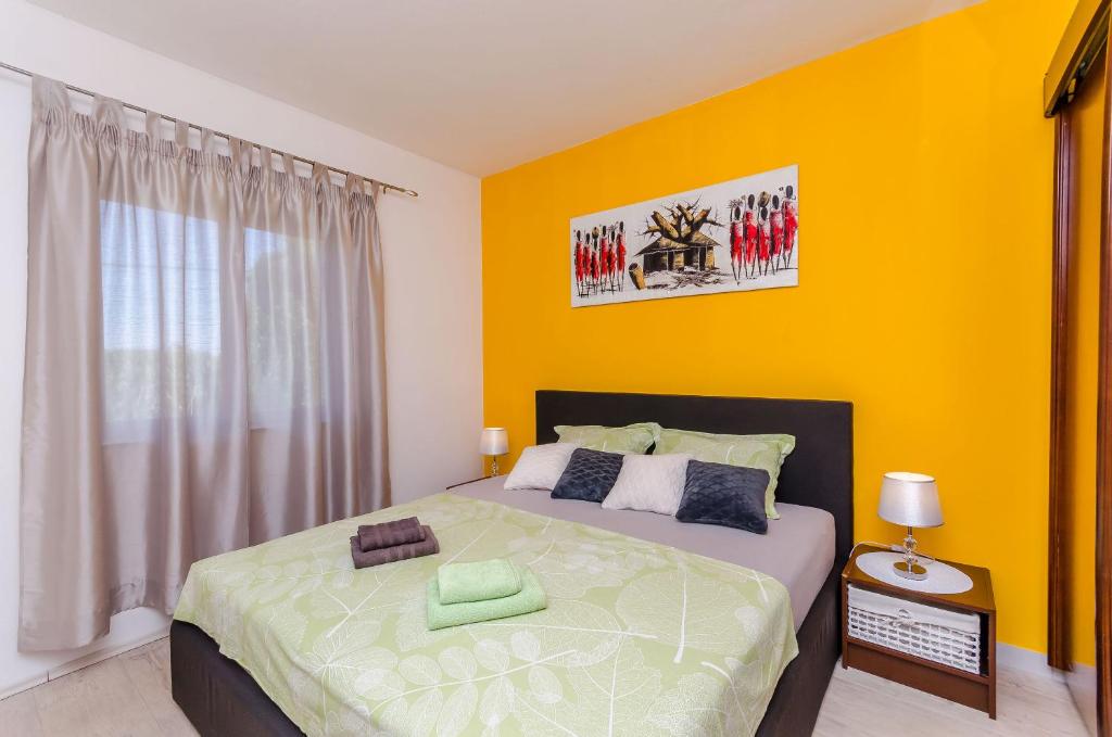 Posteľ alebo postele v izbe v ubytovaní Apartment Piveta