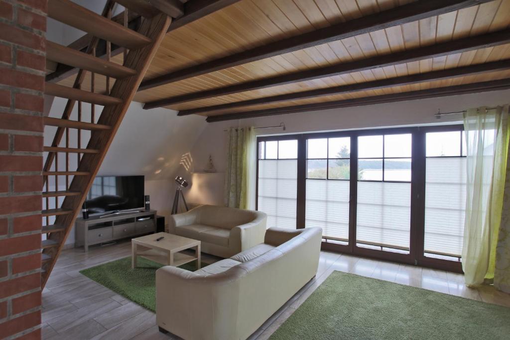 Posezení v ubytování Hotel & Restaurant Am Wasser
