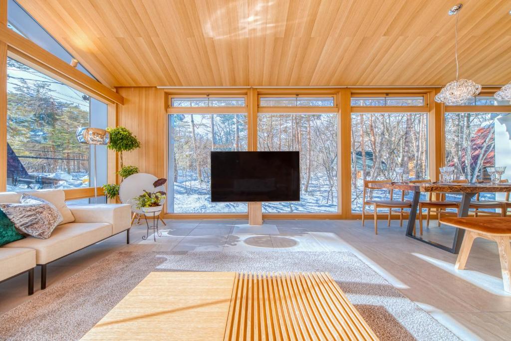 TV a/nebo společenská místnost v ubytování Hakuba Amber Resort by Jade Group