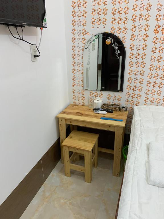 Postel nebo postele na pokoji v ubytování โรงแรมฮั่นฟาด 9 - Hostel Hạnh Phát 9