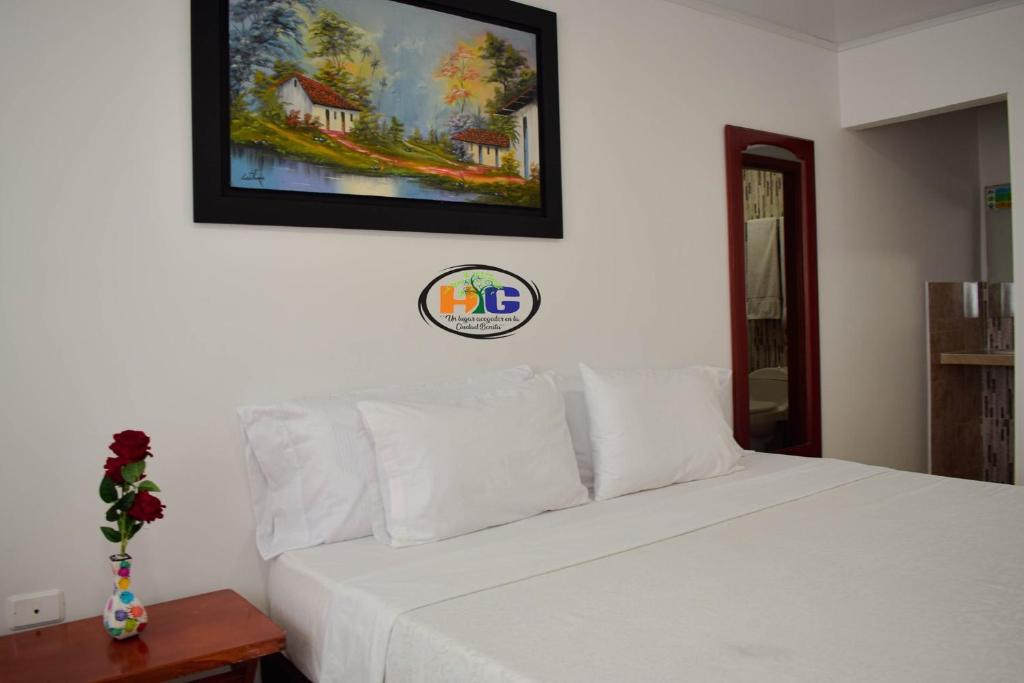 Postel nebo postele na pokoji v ubytování Hotel Getsemaní BGA