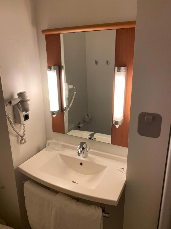 Koupelna v ubytování Hotel ibis Braga