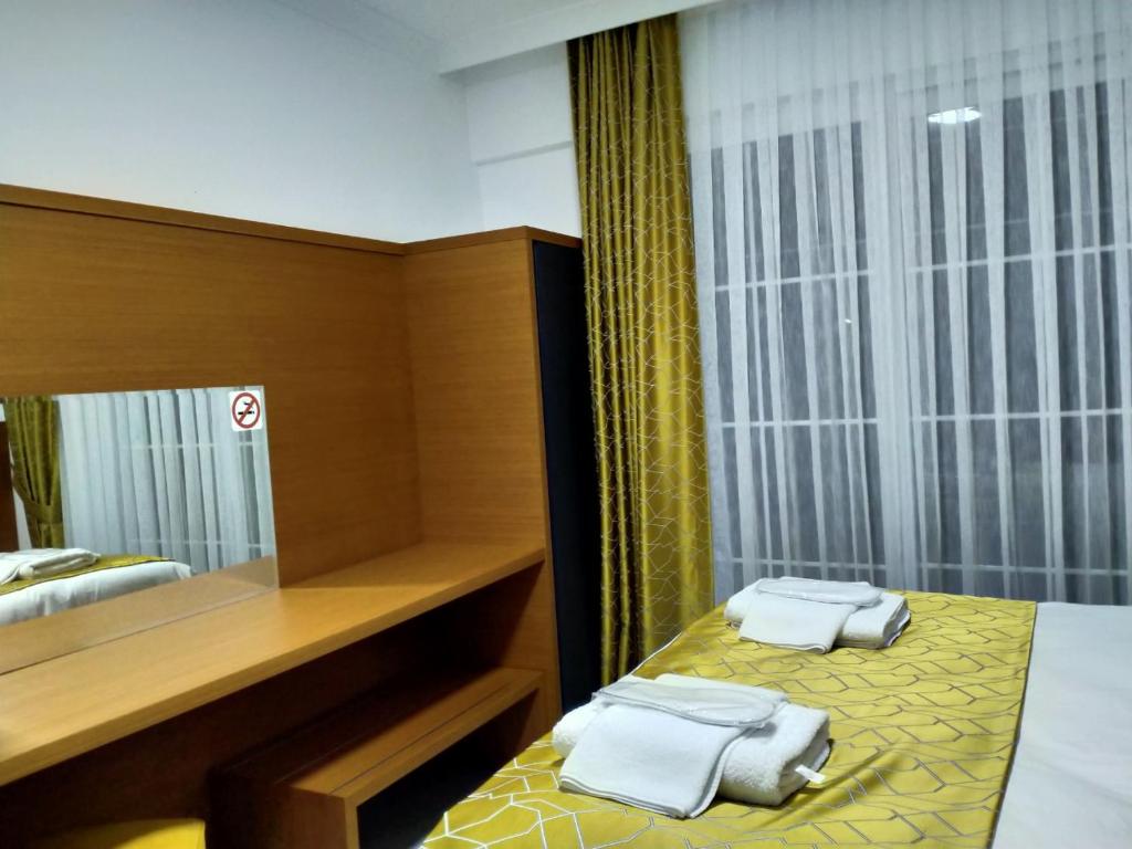 Postel nebo postele na pokoji v ubytování AdaHan Family Rooms Gocek