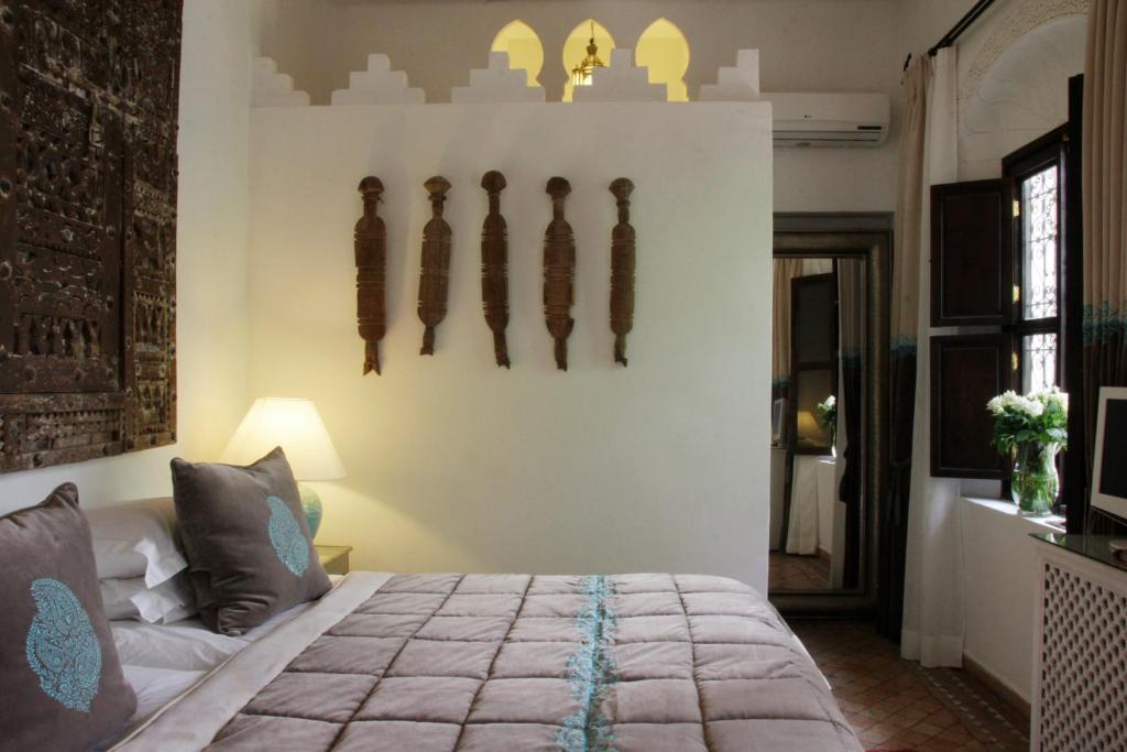Postel nebo postele na pokoji v ubytování Riad Assakina