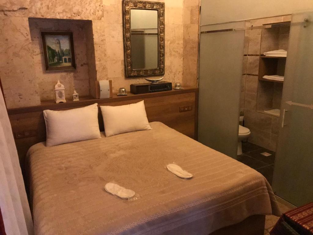 Postel nebo postele na pokoji v ubytování Gazel Butik Otel