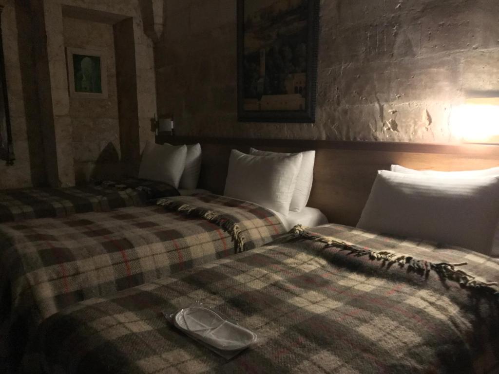 Postel nebo postele na pokoji v ubytování Gazel Butik Otel