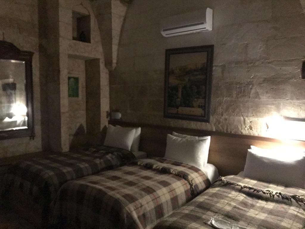Postel nebo postele na pokoji v ubytování Gazel Butik Otel