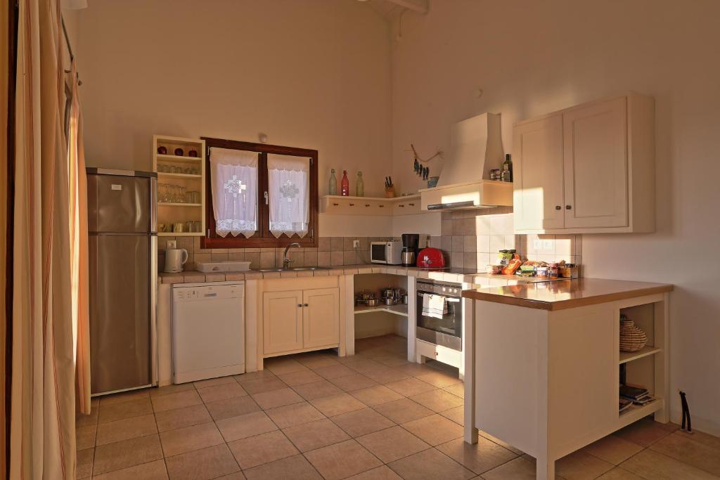 Kuchyňa alebo kuchynka v ubytovaní dreamvillas-crete - villa Helios - villa Thalassa
