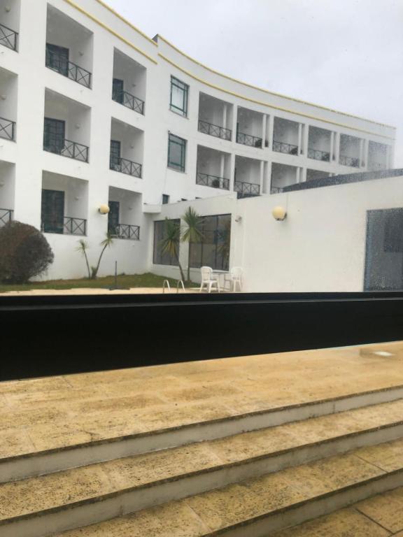 a view of a building from a train window at Hotel Castelo de Vide in Castelo de Vide