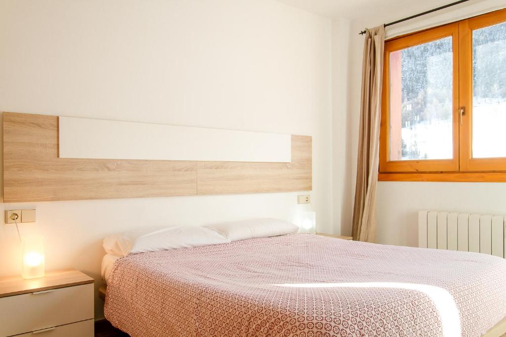 Ένα ή περισσότερα κρεβάτια σε δωμάτιο στο Apartamento Tarter Parc 1 habitación