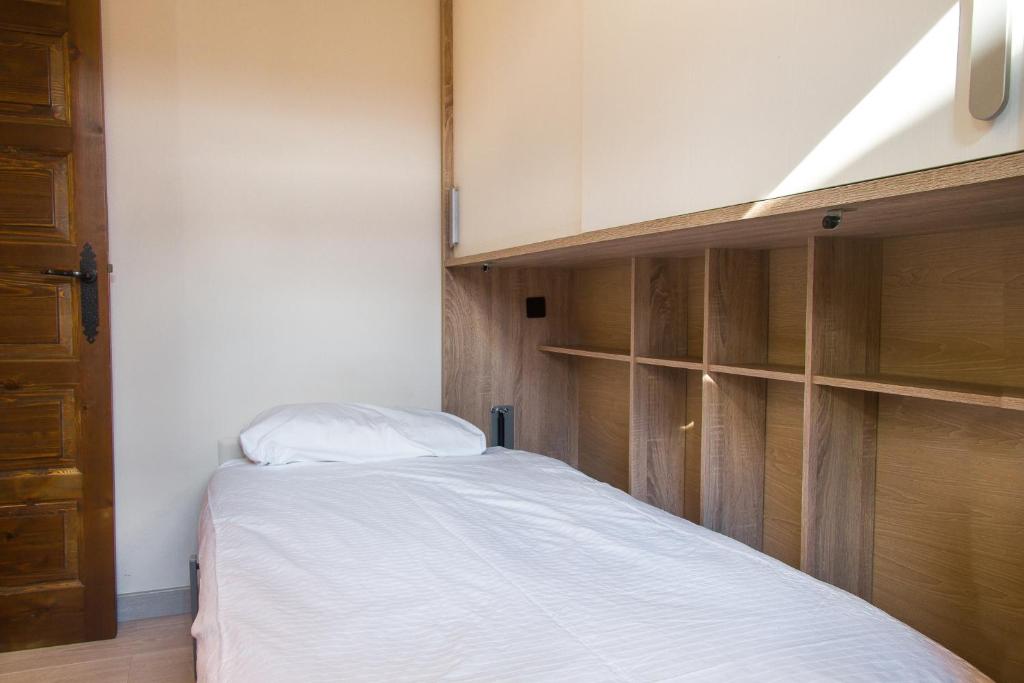Ліжко або ліжка в номері Apartamento Refugi d'Incles 6 personas