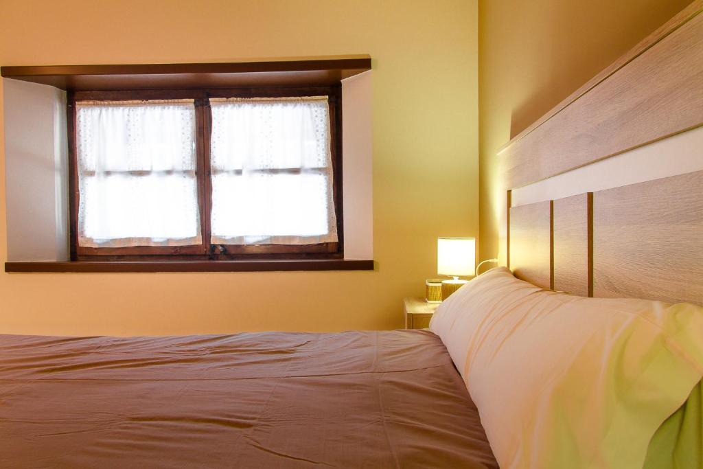 Ліжко або ліжка в номері Apartamento Refugi d'Incles 6 personas