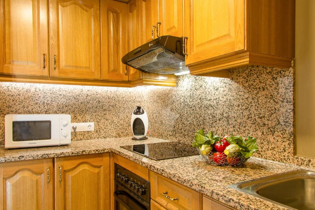 Кухня або міні-кухня у Apartamento Refugi d'Incles 6 personas