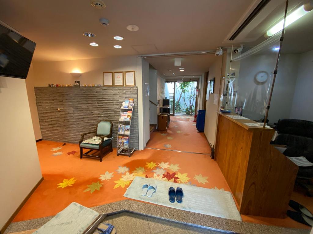 TV a/nebo společenská místnost v ubytování Atami Onsen Guest House Megumi