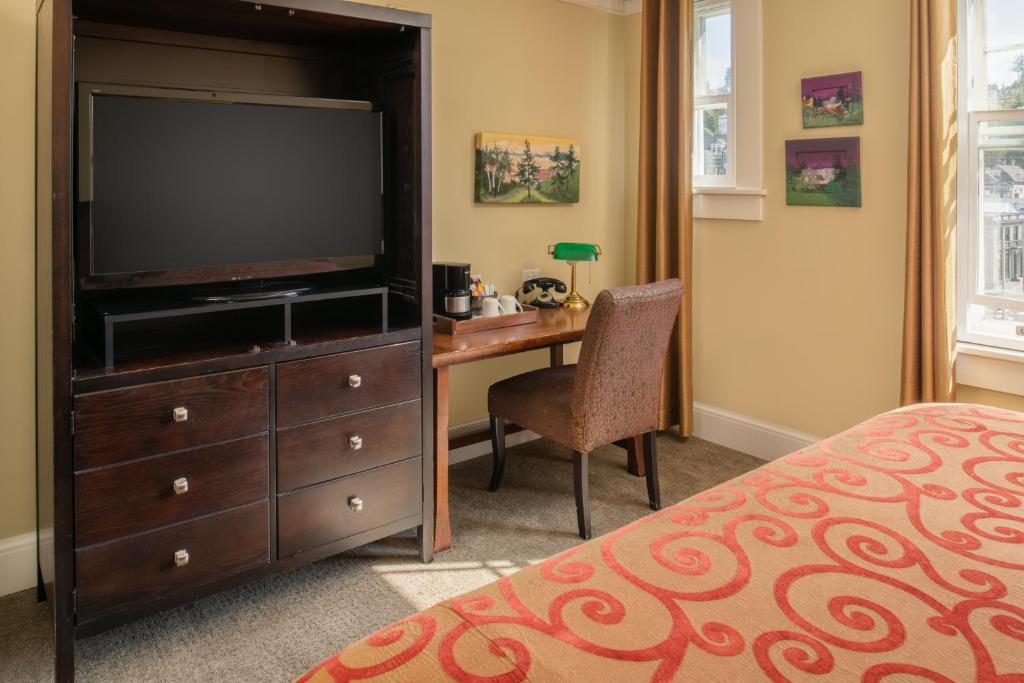 Postel nebo postele na pokoji v ubytování Hotel Elliott