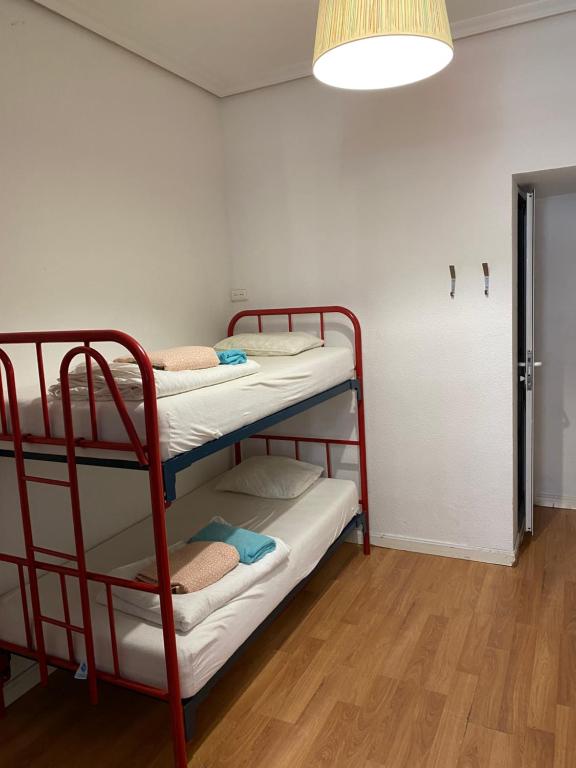 Cama o camas de una habitación en Barbieri Sol Hostel