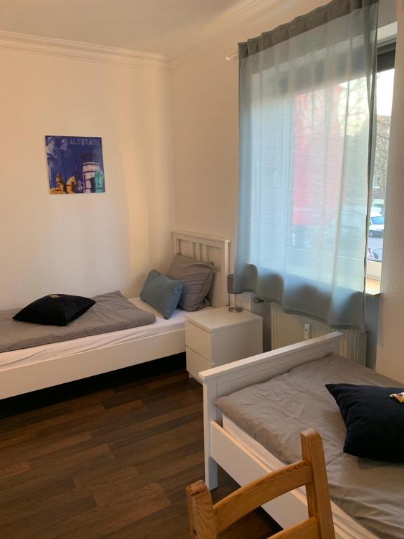 Postel nebo postele na pokoji v ubytování Zum armen Mann