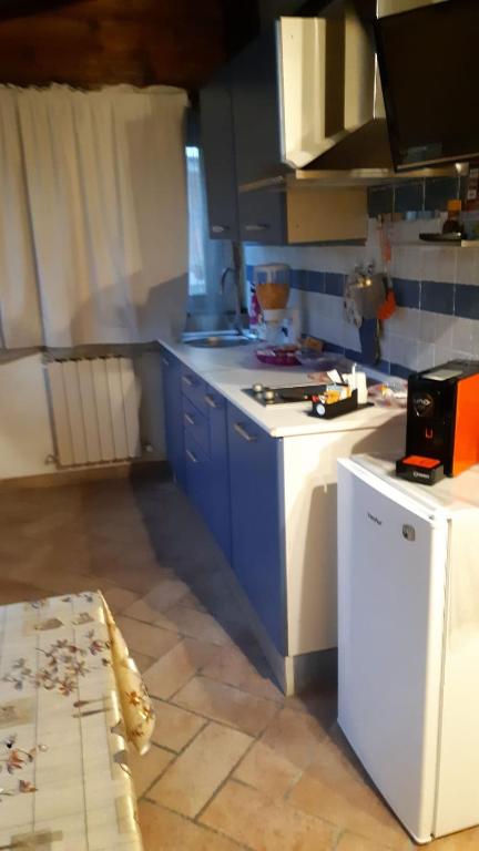 Kuchyň nebo kuchyňský kout v ubytování Il Castagneto