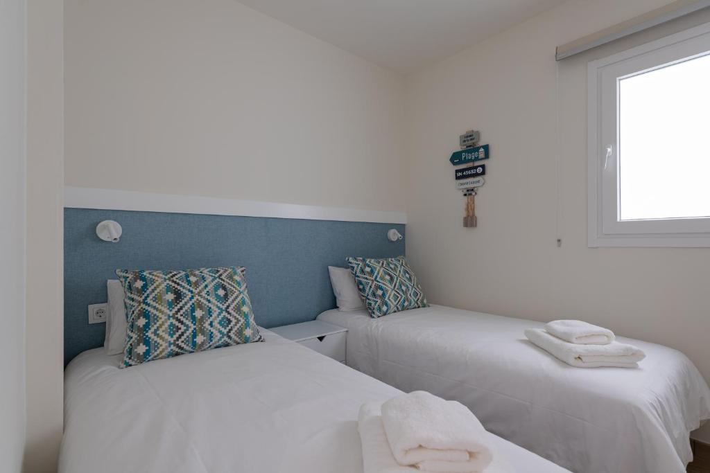 Posteľ alebo postele v izbe v ubytovaní Elegant living with great views of Las Canteras Beach