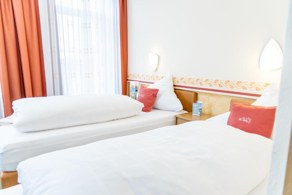 Postel nebo postele na pokoji v ubytování Hotel Der Seehof