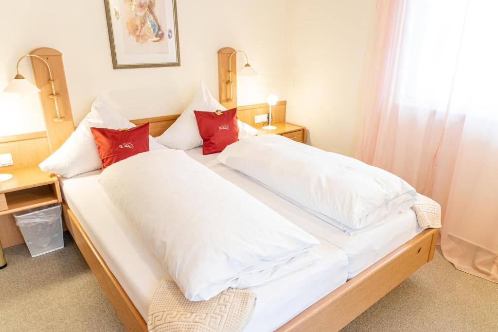 Postel nebo postele na pokoji v ubytování Hotel Der Seehof