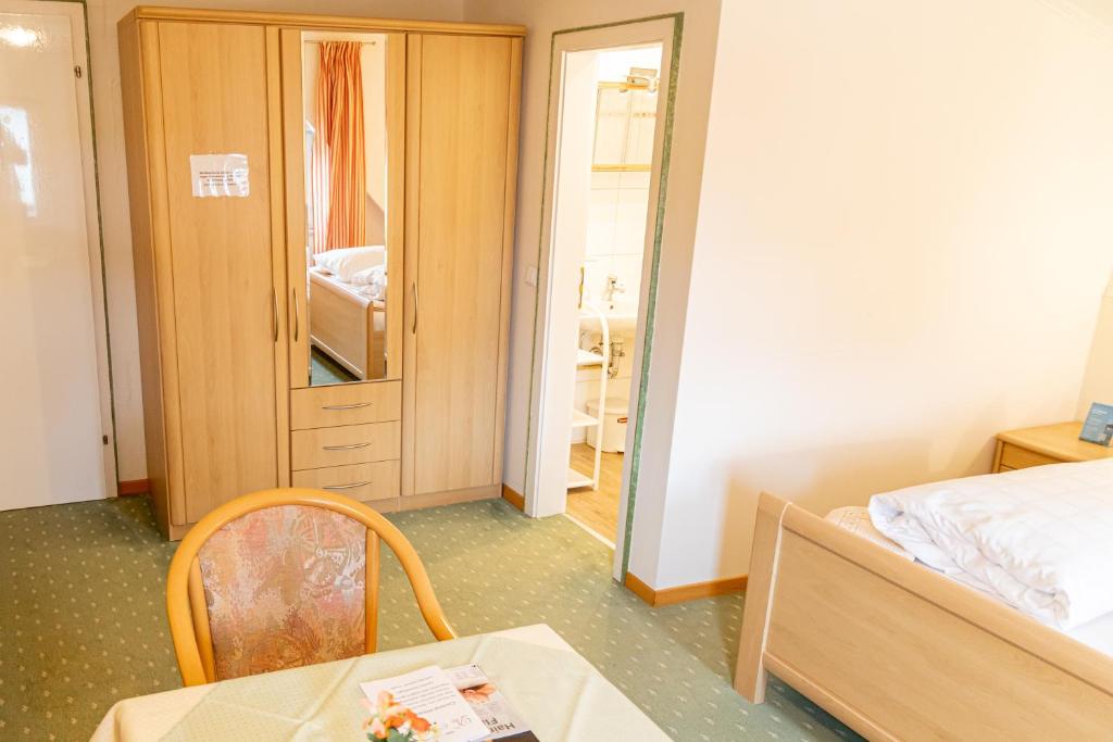 Postel nebo postele na pokoji v ubytování Hotel Der Seehof