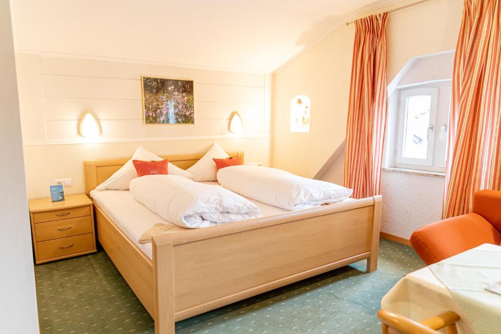 Postel nebo postele na pokoji v ubytování Hotel Der Seehof