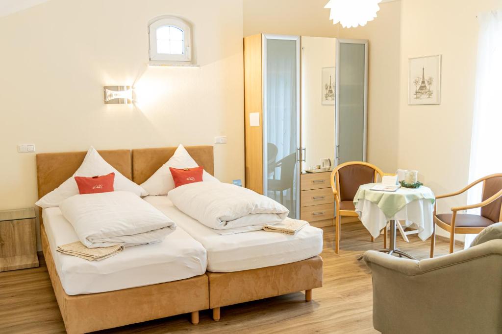 Postel nebo postele na pokoji v ubytování Hotel Der Seehof