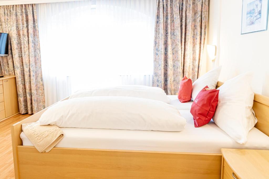 Postel nebo postele na pokoji v ubytování Hotel Der Seehof