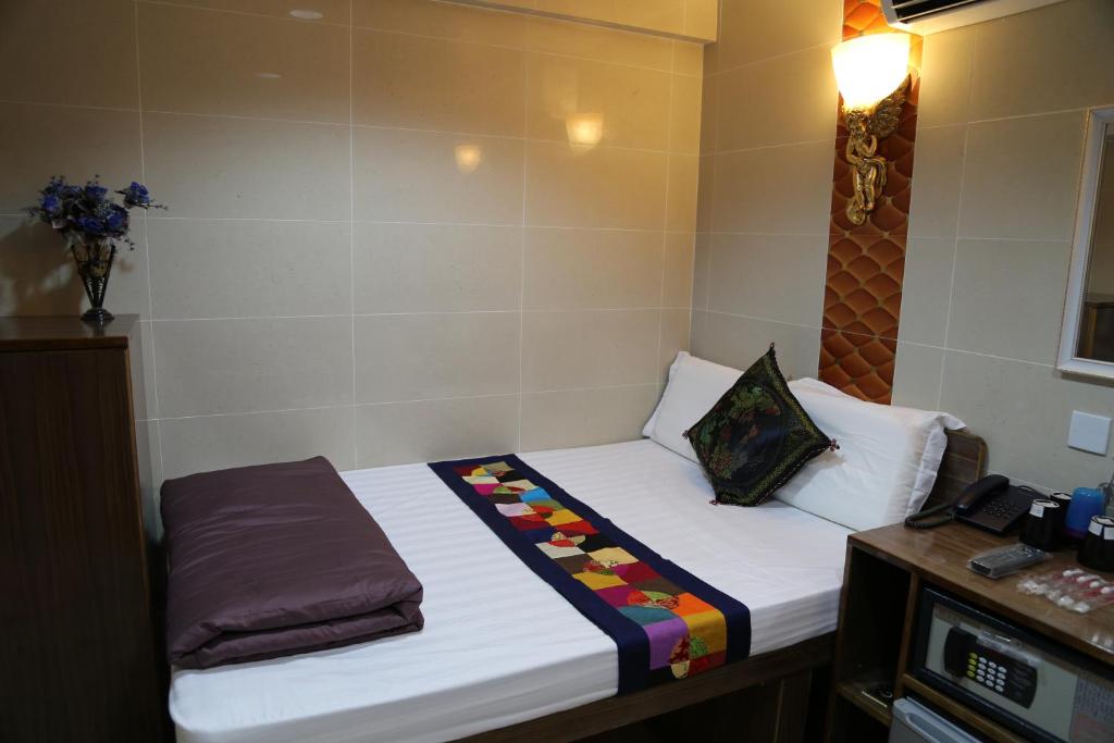 Postel nebo postele na pokoji v ubytování New Tokyo Hostel