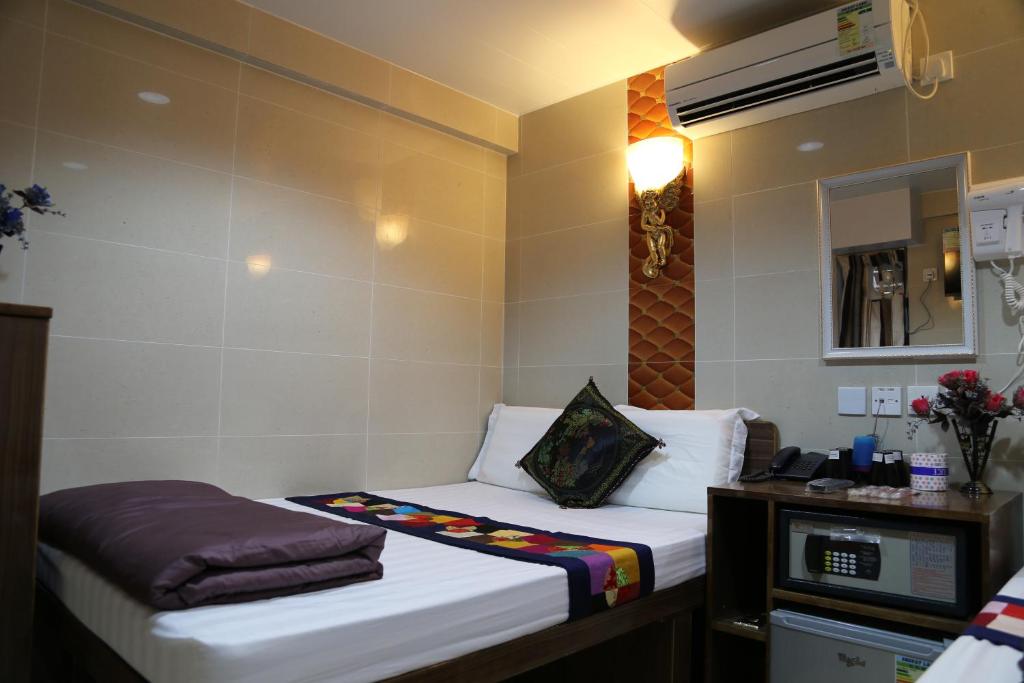 Postel nebo postele na pokoji v ubytování New Tokyo Hostel