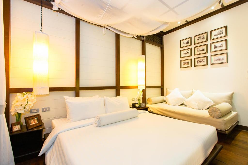Letto o letti in una camera di The Memory at On On Hotel