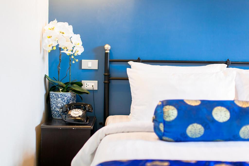 Letto o letti in una camera di The Memory at On On Hotel