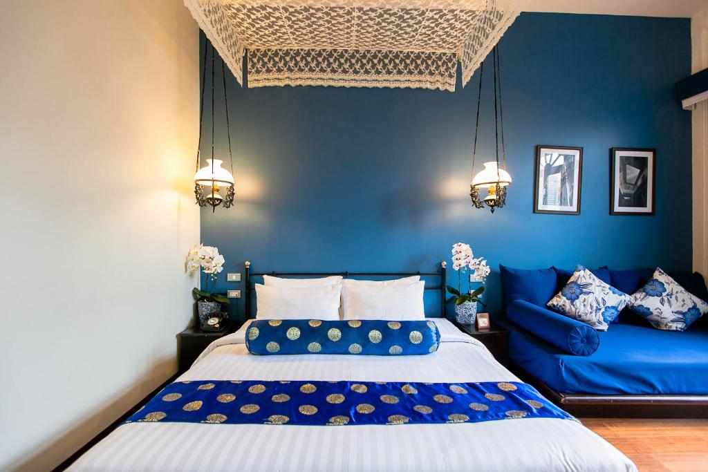 Letto o letti in una camera di The Memory at On On Hotel