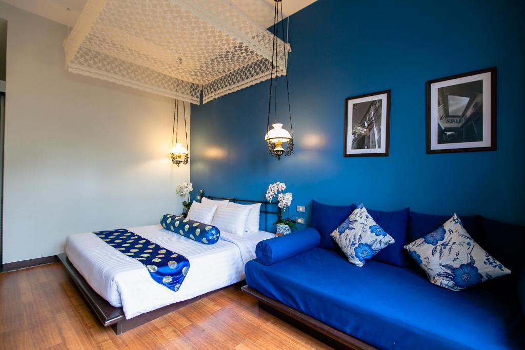 Letto o letti in una camera di The Memory at On On Hotel
