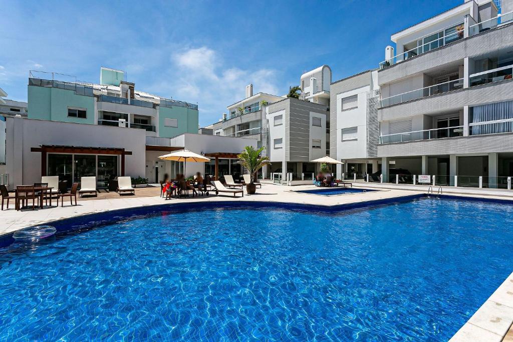  Apto novo em prédio c/ piscina nos Ingleses RTG208